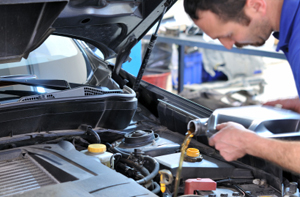 Mechanic working on car